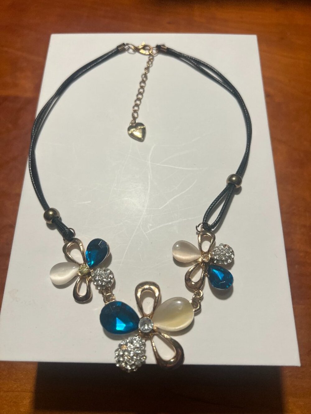 Betsey Johnson Choker Style Necklace on a Black Leatherette Cord, Teal/Cream